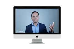 The 8 Ways To Triple Your Website Leads video course shown on a laptop